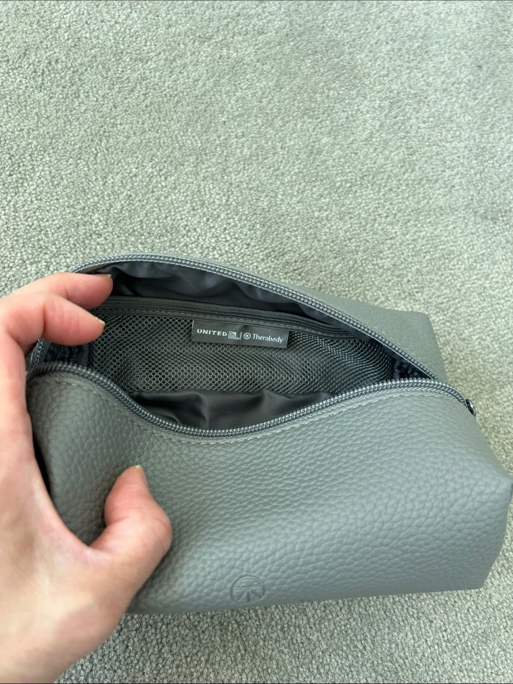 Therabody Grey Pebbled Leather Travel Pouch from United Airlines